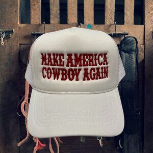 make america cowboy again white embroidered trucker hat